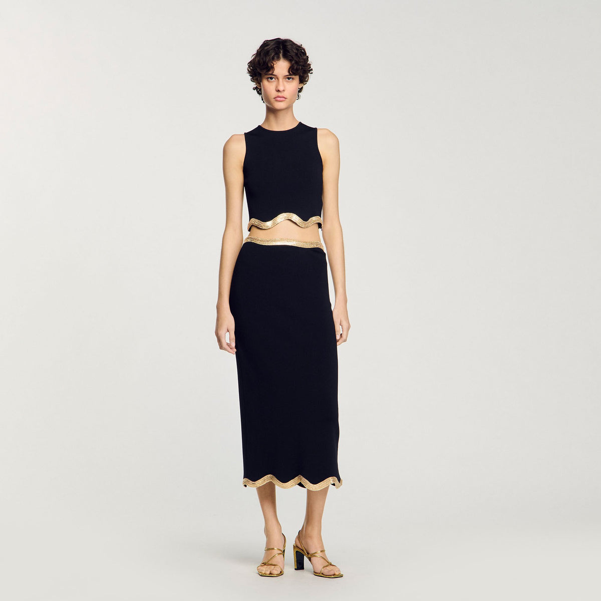 Sandro Maxi knitted skirt with chain detail Black