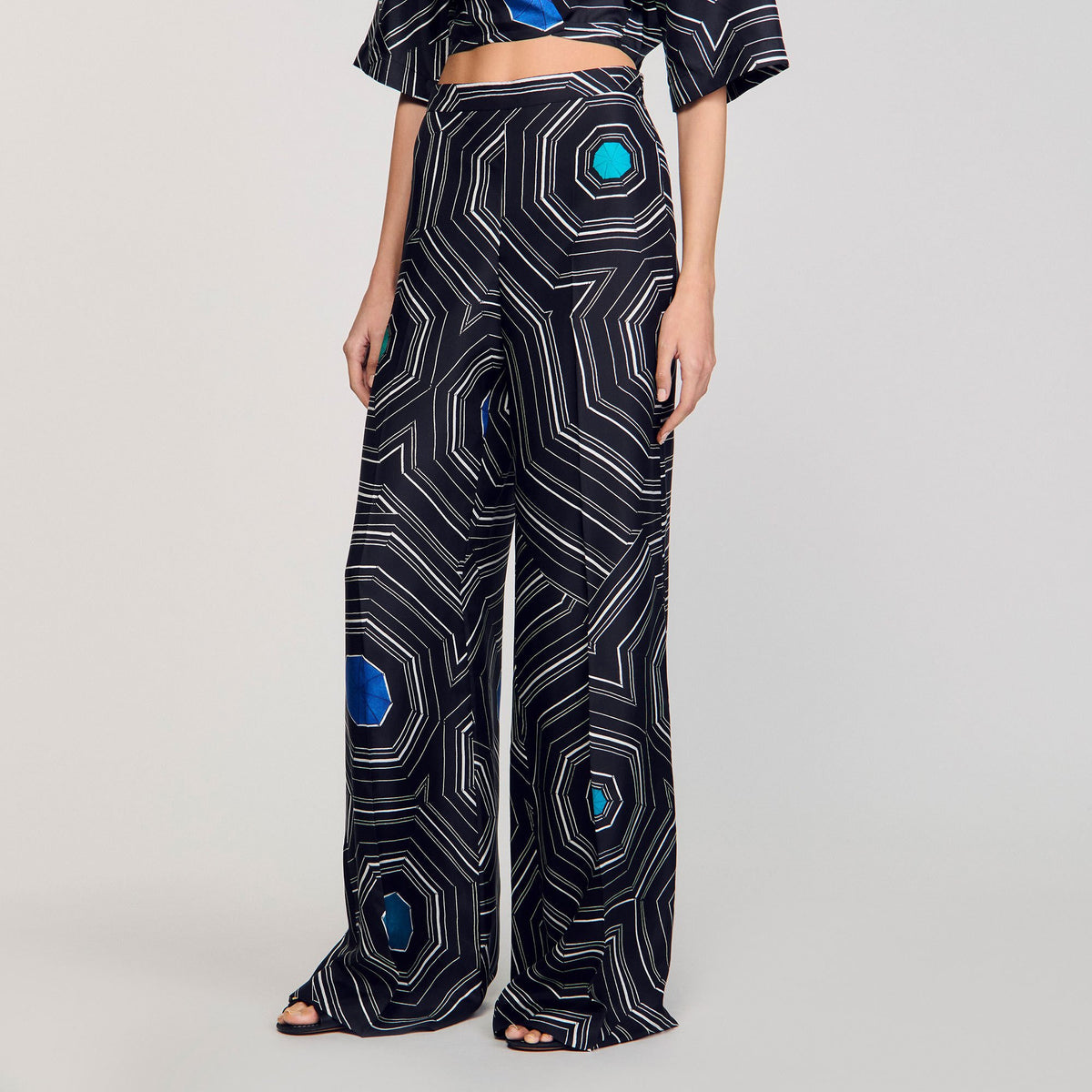 Sandro Spiral-print silk trousers Black
